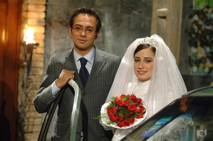 بازیگران فیلم صدسال به این سال‌ها علی قربان‌زاده و نگار جواهریان