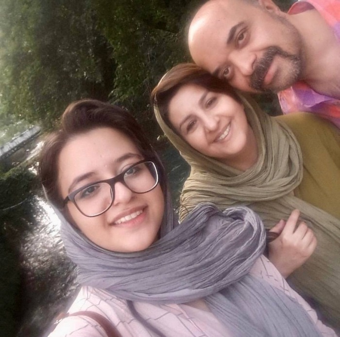 آرش نوذری و همسرش در کنار دخترشان